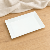 White rectangular platter in a natural tabletop setting