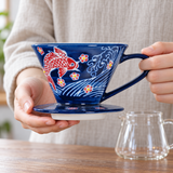 SFD1-6299 patterned coffee dripper held by handle with base supported