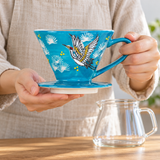 SFD1-7100 patterned coffee dripper held by handle with base supported
