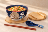 Bowl set serving chicken and vegetable rice with one unwrapped chopstick pair