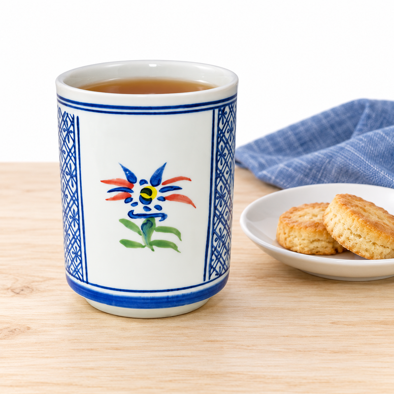 SH70-4 with tea, beside a separate plate of biscuits.