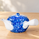 SH9-3 blue floral side-handle teapot on a dining table