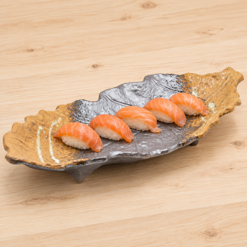 16″ × 7″ Black & Brown Ceramic Leaf Serving Platter — Sushi arranged along the leaf