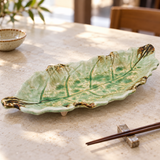 Empty SP2163-C porcelain leaf platter showing its scalloped outline and raised veins