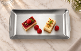 SS-REP-12 satin stainless steel plate with a small dessert portion