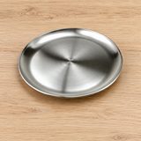SS-RP-10 satin stainless steel round plate on a dining table
