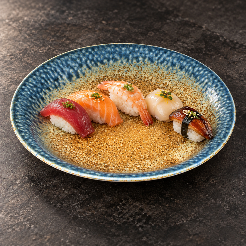 Nigiri sushi on the blue and brown 10½-inch porcelain plate