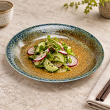 Cucumber and radish salad on the green-blue and gold-brown 9½-inch porcelain plate