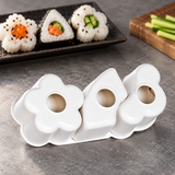 White three-shape 151381 sushi mold at a sushi preparation station