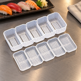 L-858E transparent five-cavity mold and press on a restaurant prep counter