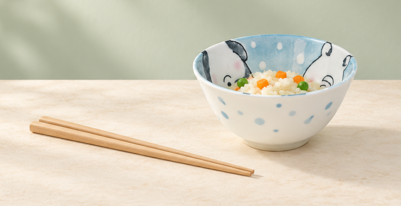 Serving suggestion with vegetable rice in the aqua animal-character bowl and chopsticks alongside.