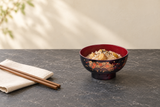 Y61-MM: Chestnut rice on a charcoal tabletop.