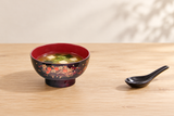 Y61-MM: Tofu and wakame miso soup on pale wood.