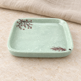 YG-405PB pale green plum-pattern dish on a tabletop