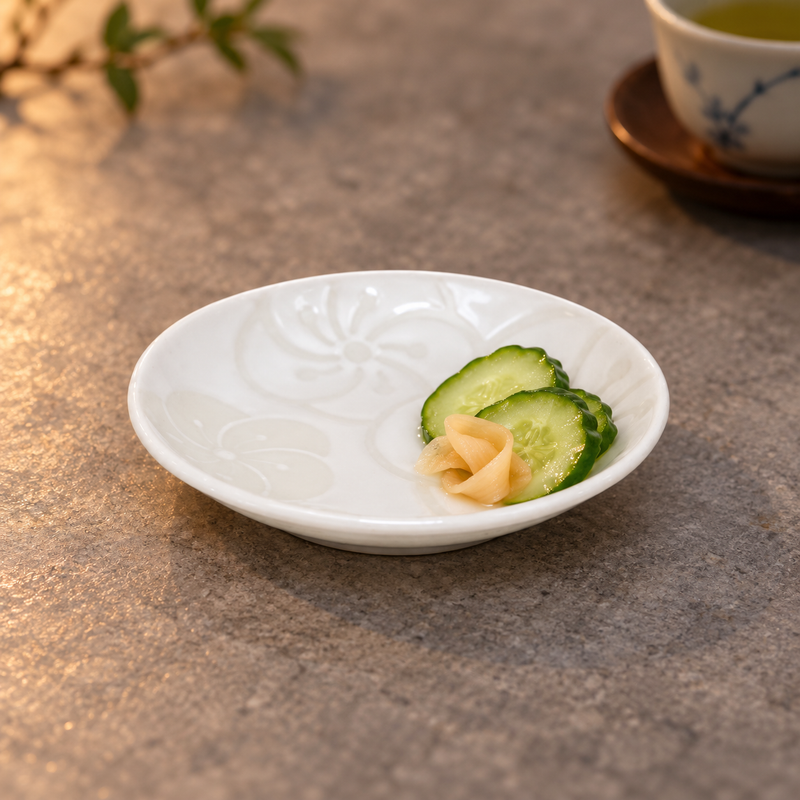 YG24-KP white Kyo Plum ceramic sauce dish with cucumber pickles and ginger