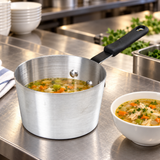 5.5 Qt Aluminum Sauce Pan with Bakelite Handle with a finished food preparation