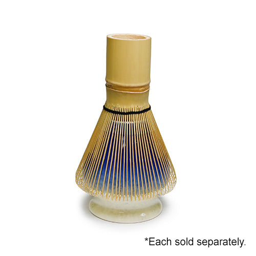 G-1904 — a whisk resting over the holder