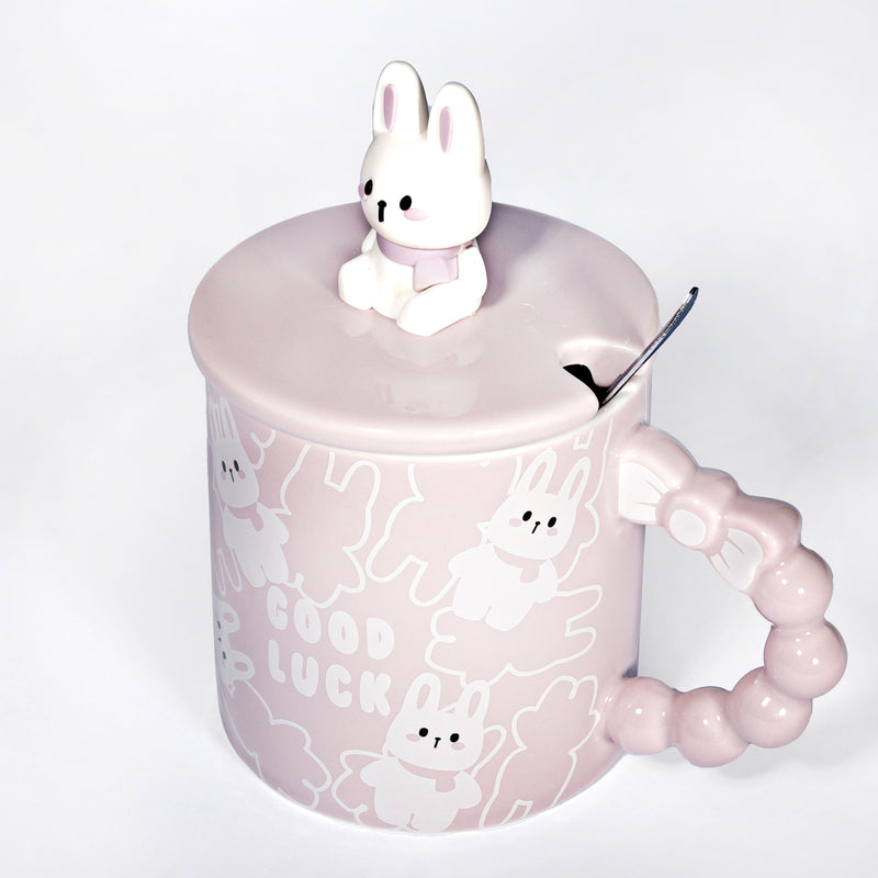 PC47-2 dusty pink rabbit mug with figurine lid, spoon and beaded handle