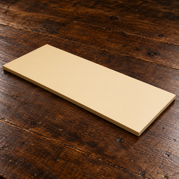 H10B-20 plain rectangular beige cutting board on a wooden worktable