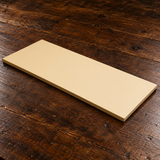H10B-20 plain rectangular beige cutting board on a wooden worktable