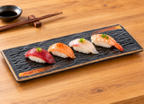 IT-1223G textured black plate with two gold brush accents and nigiri; serving suggestion