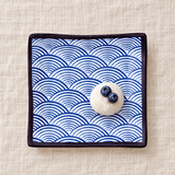 Blue wave square melamine plate with mochi and blueberries