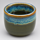 Detail of one included JX9-3 sake cup in an elevated oblique view