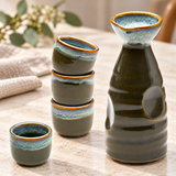 JX9-3 sake set with one bottle and four cups on a stone table