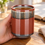 KA70-1 red faceted teacup held during a tea break