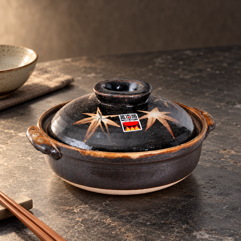 D6-ML maple-leaf donabe in a restaurant table setting