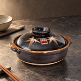 D6-ML maple-leaf donabe on a dining table