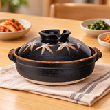 D9-ML maple-leaf donabe on a dining table