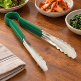 SLTG810G utility tong in a restaurant setting
