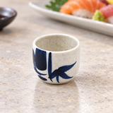 KY8-B blue bamboo sake cup on a stone table