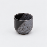 KY8-NW black and gray speckled sake cup viewed from an elevated angle