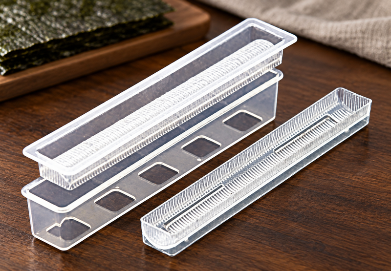 L-8582 clear sushi mold components on a wooden preparation surface