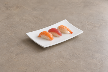 White curved rectangular melamine plate with sushi