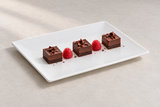 White rectangular melamine plate with chocolate dessert