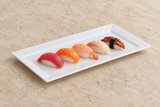 White rectangular melamine platter in a savory serving scene