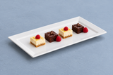 White rectangular melamine platter in a dessert serving scene