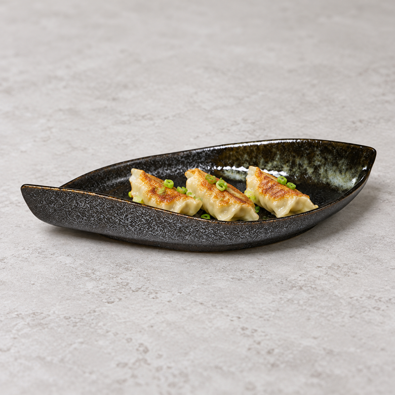 MA311-BR dark ceramic leaf plate with a small gyoza serving