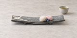 MK212-WB dark rectangular ceramic plate with petite mochi and blueberries