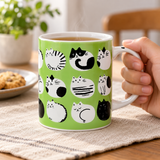 PH72-C4 light green cat-pattern mug held during tea service