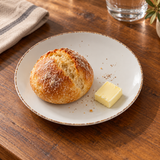 Splash Blanch 6¼-inch side plate with a bread roll and butter