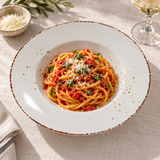 Splash Blanch wide-rim pasta bowl serving spaghetti in its center well