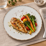 Splash Blanch 10-inch stackable plate with chicken and vegetables