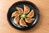1812TM12-inch black and brown Tenmoku lotus plate serving dumplings