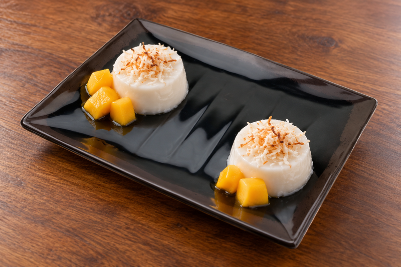 511-TM broad rectangular Tenmoku plate with coconut puddings and mango