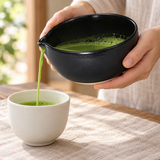 K537-SB black spouted matcha bowl pouring into a separate teacup