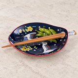 Crane-pattern ceramic dish and chopsticks with edamame